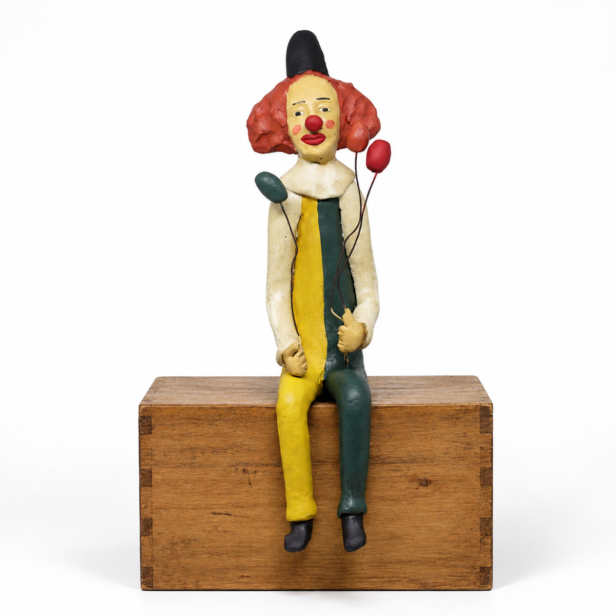 Escultura Palhaço Sentado em Cerâmica
