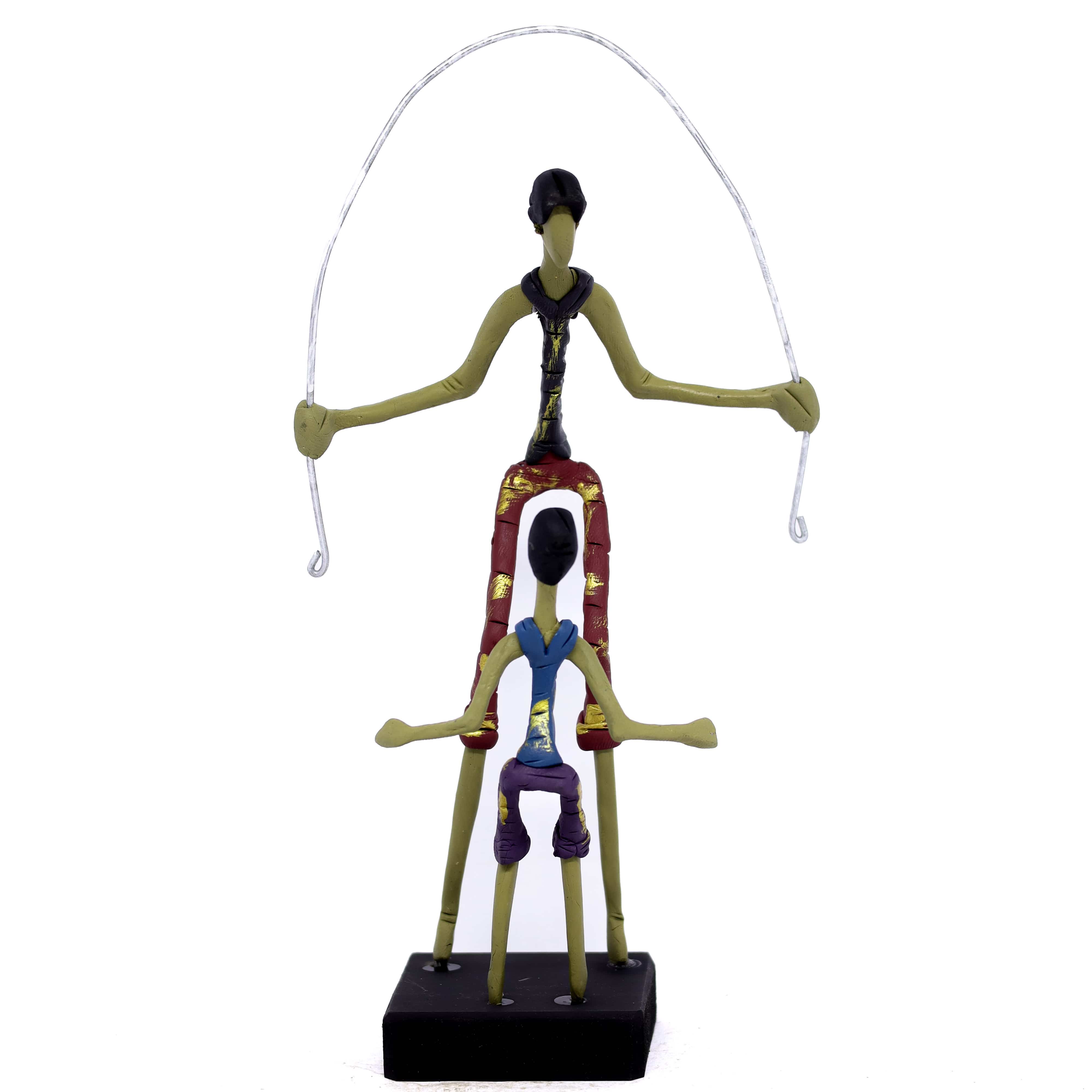 Escultura Pai e Filho Pulando Corda