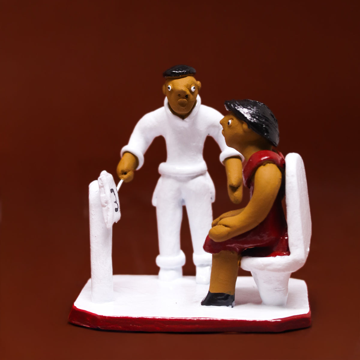 Escultura Profissões em Cerâmica - Oftalmologista