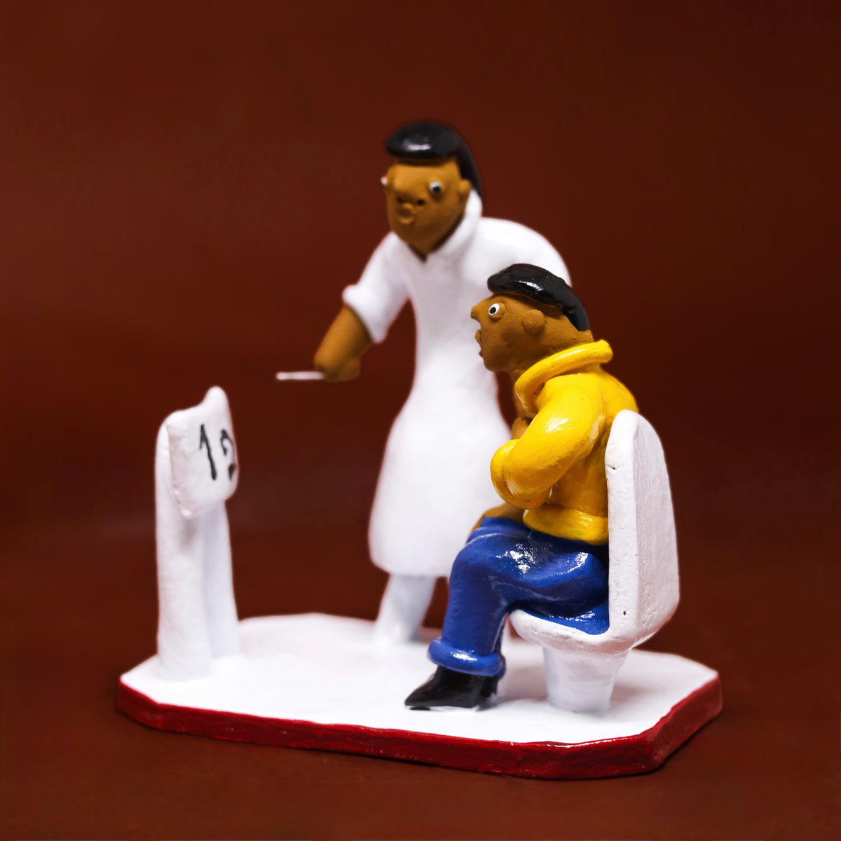 Escultura Profissões em Cerâmica - Oftalmologista