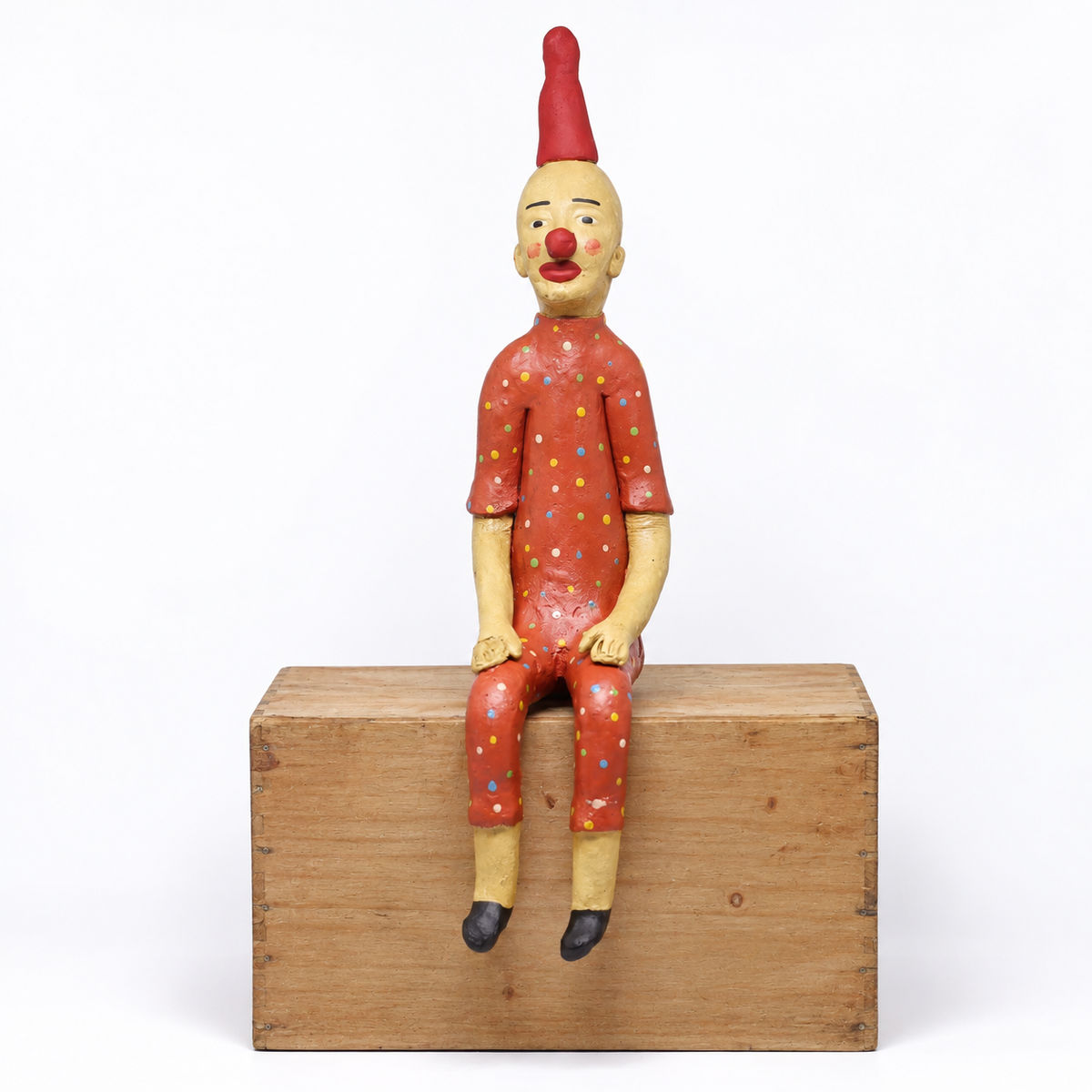 Escultura Palhaço Sentado em Cerâmica