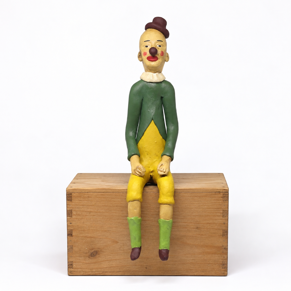 Escultura Palhaço Sentado em Cerâmica