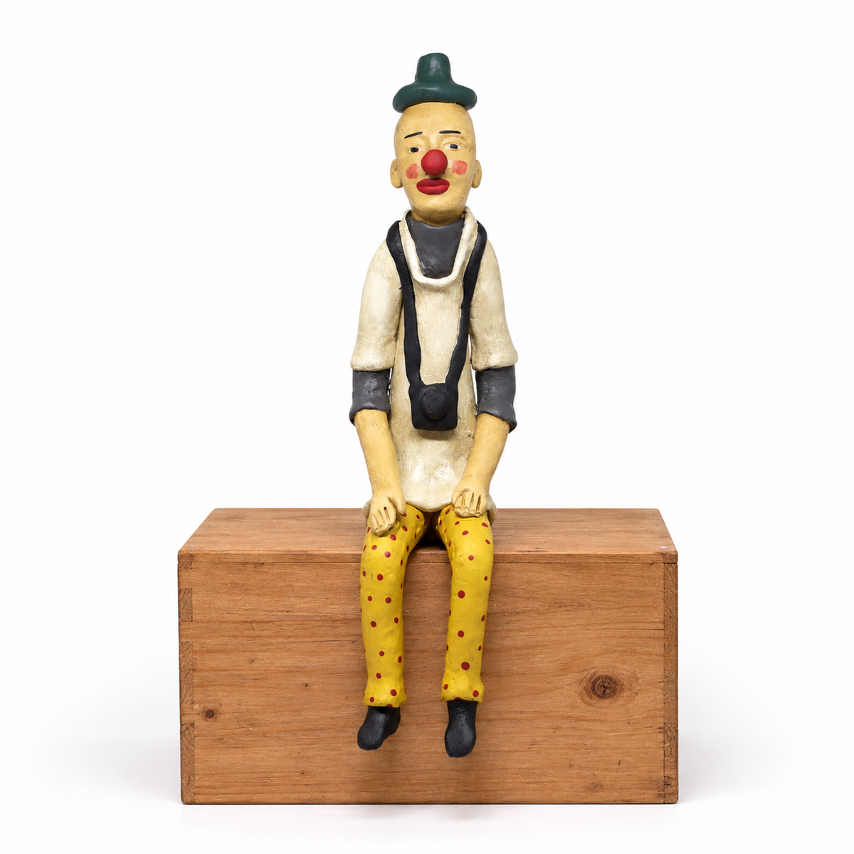 Escultura Palhaço Sentado em Cerâmica
