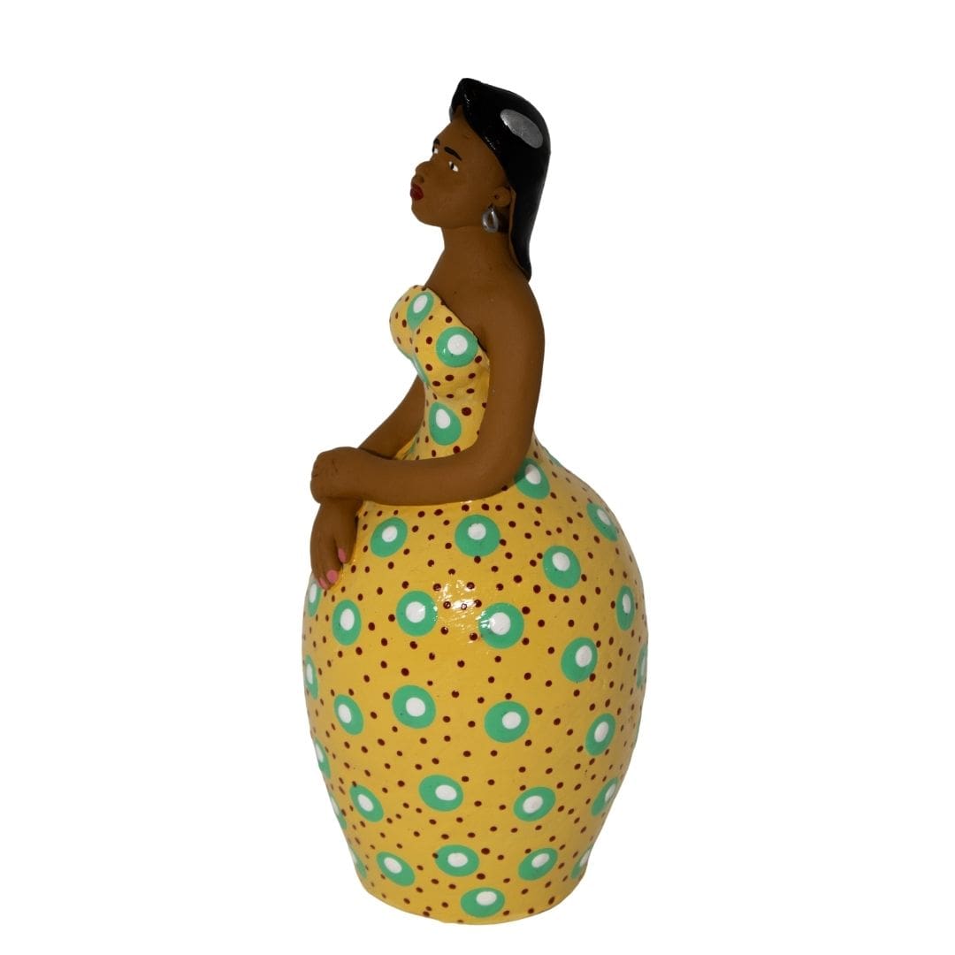 Escultura Dondoca charmosa amarela