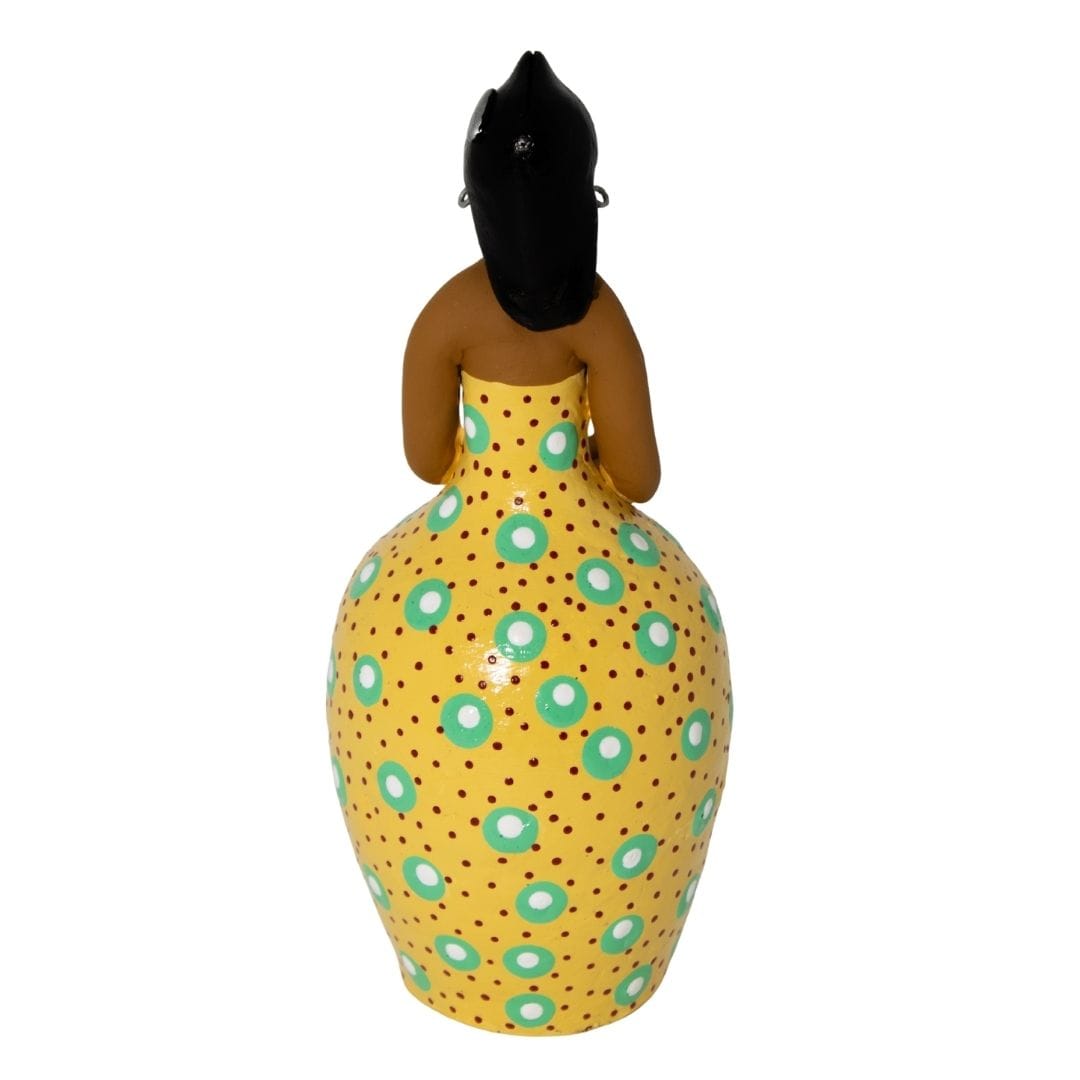 Escultura Dondoca charmosa amarela