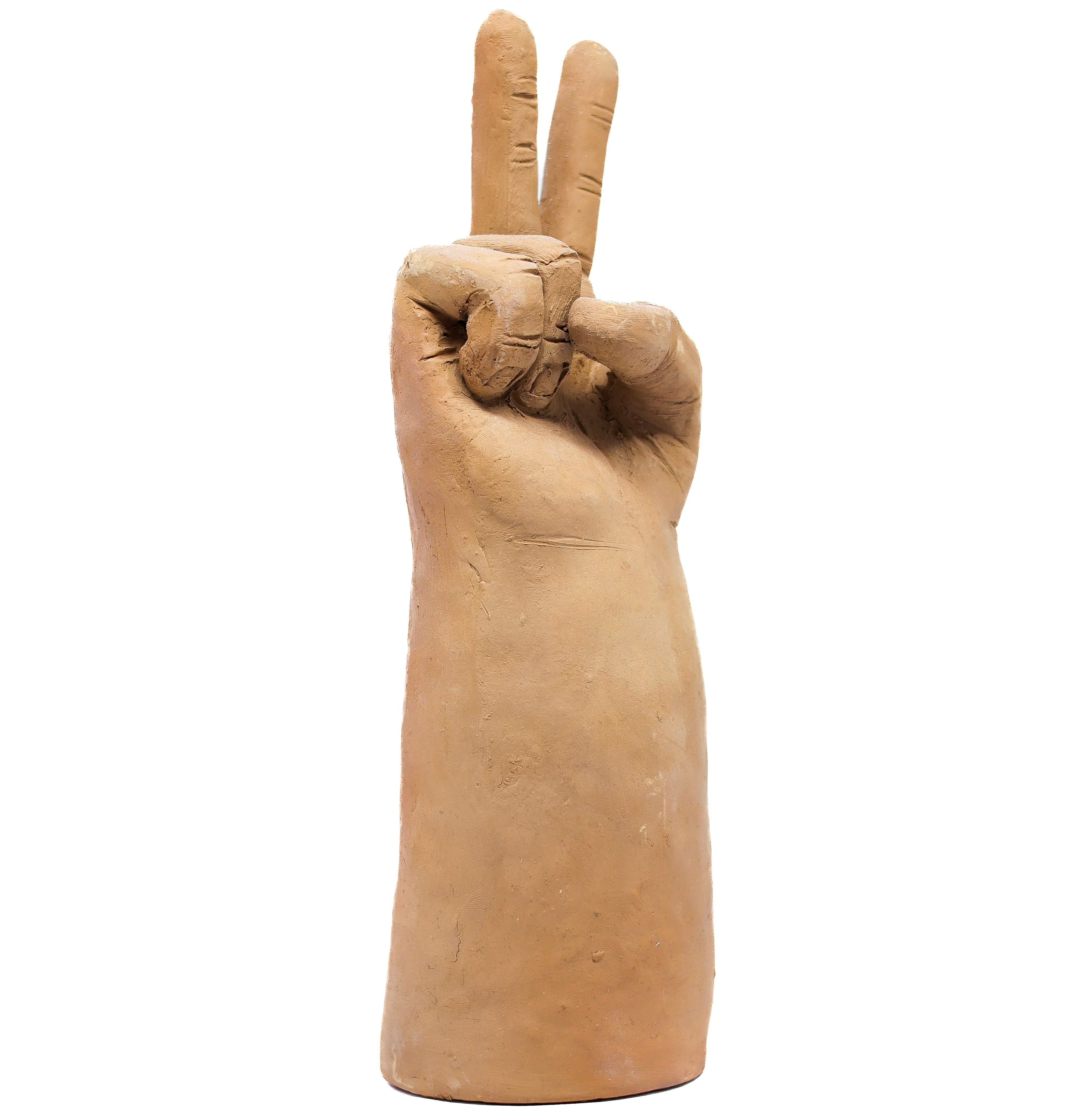 Escultura Paz em Barro