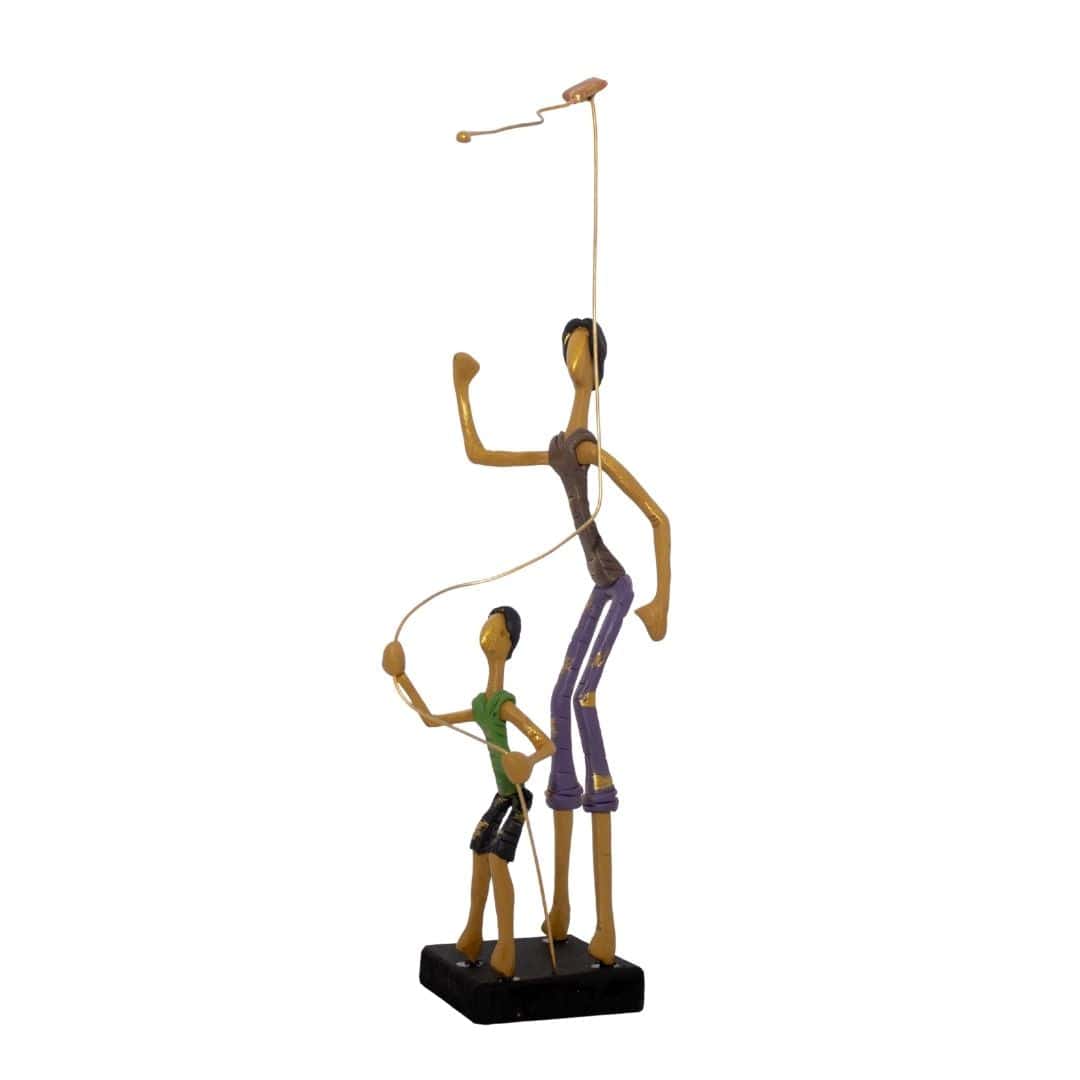 Escultura Pai e Filho com Pipa