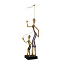 Escultura Pai e Filho com Pipa