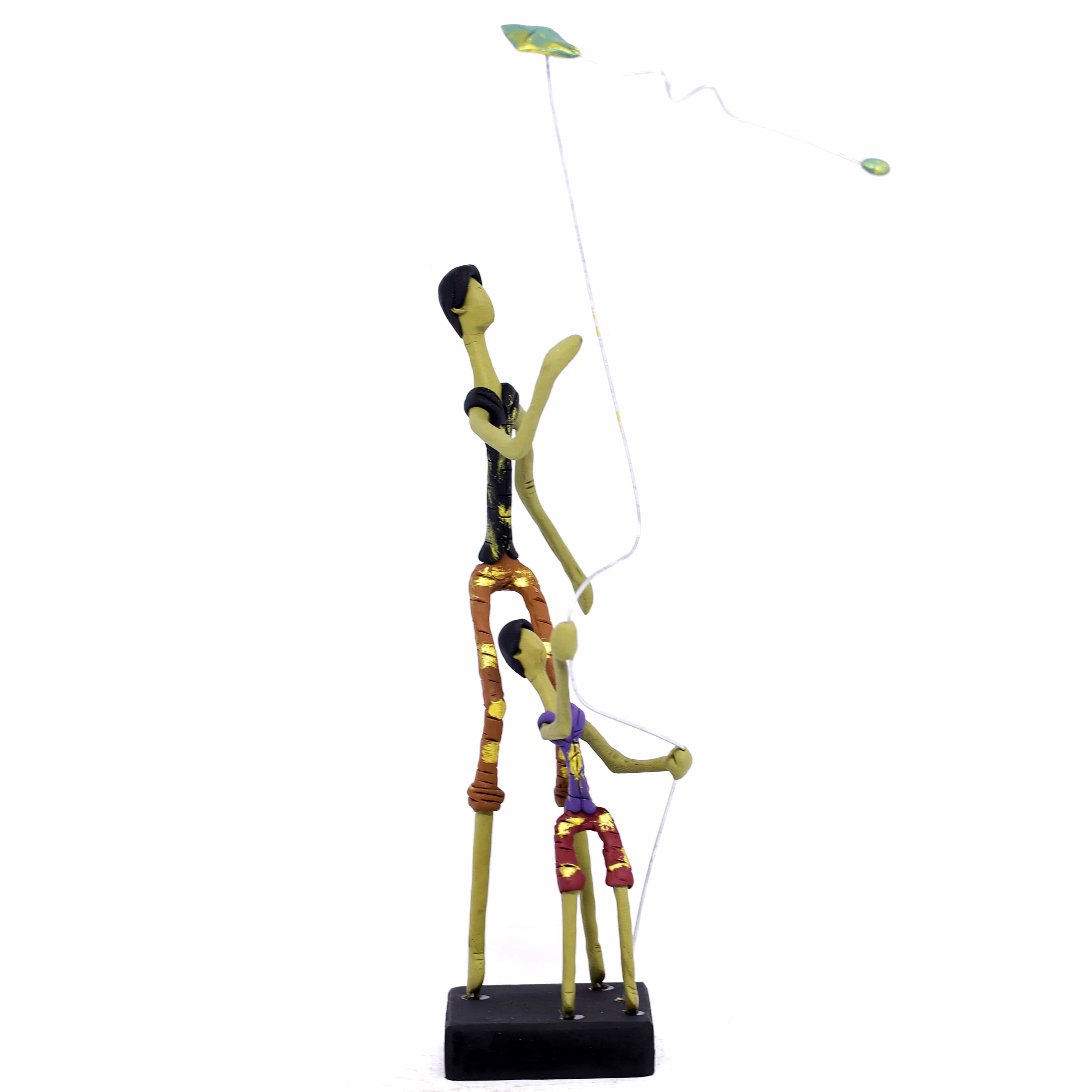 Escultura Pai e Filho Empinando Pipa