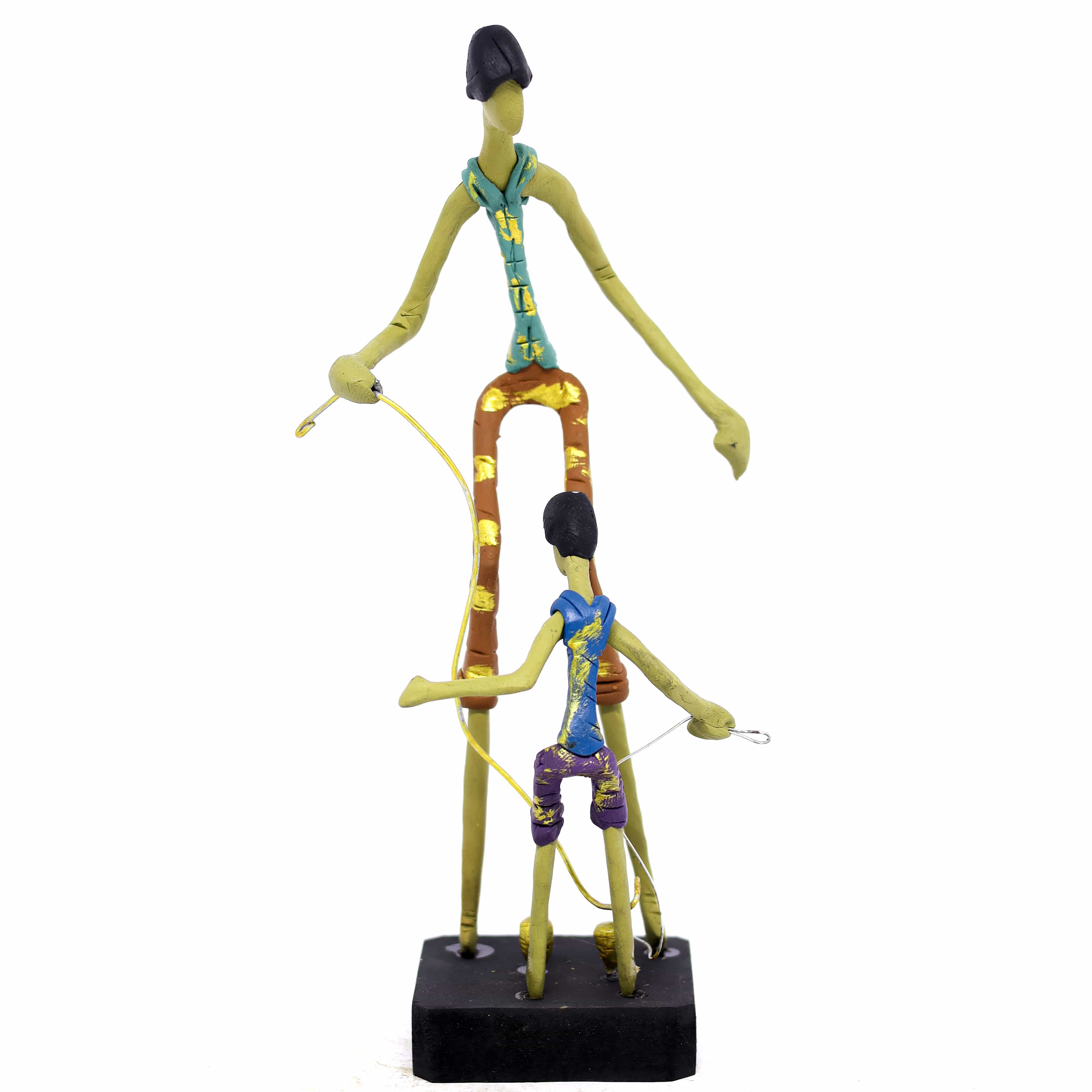 Escultura Pai e Filho Pião