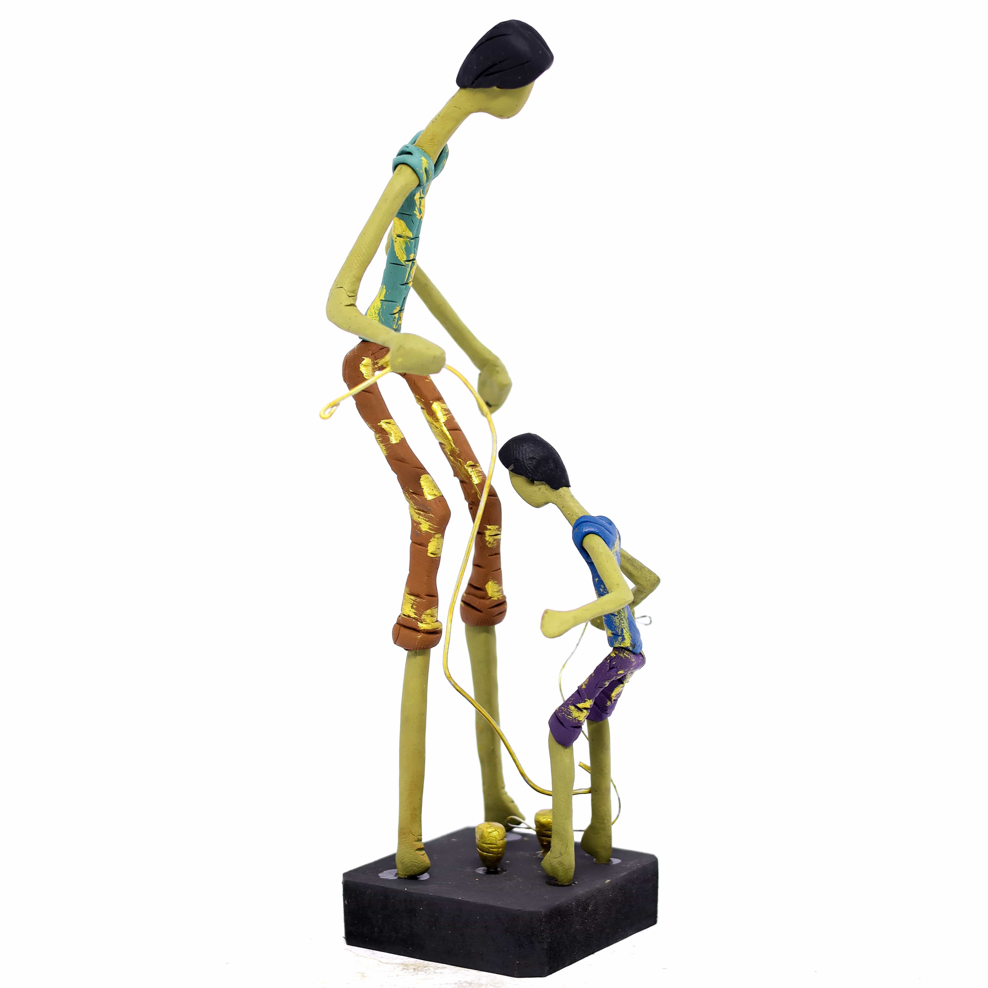 Escultura Pai e Filho Pião