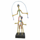 Escultura Pai e Filho pulando corda