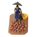 Miniatura vendedora de Panelinha